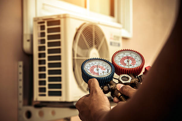 Professional Ac Installation technician working in Coal Valley, IL